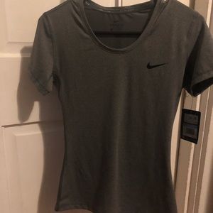 NWT Nike Pro T-shirt Gray w/ black swoosh. Women’s size Medium. Fitted.